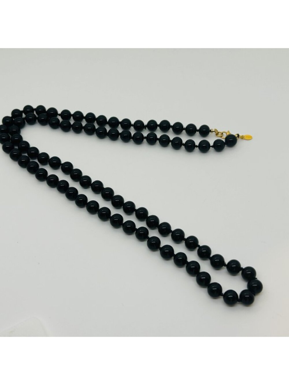 Vintage Monet Signed Glossy Black Glass Bead Necklace With Gold Tone Clasp 30 In